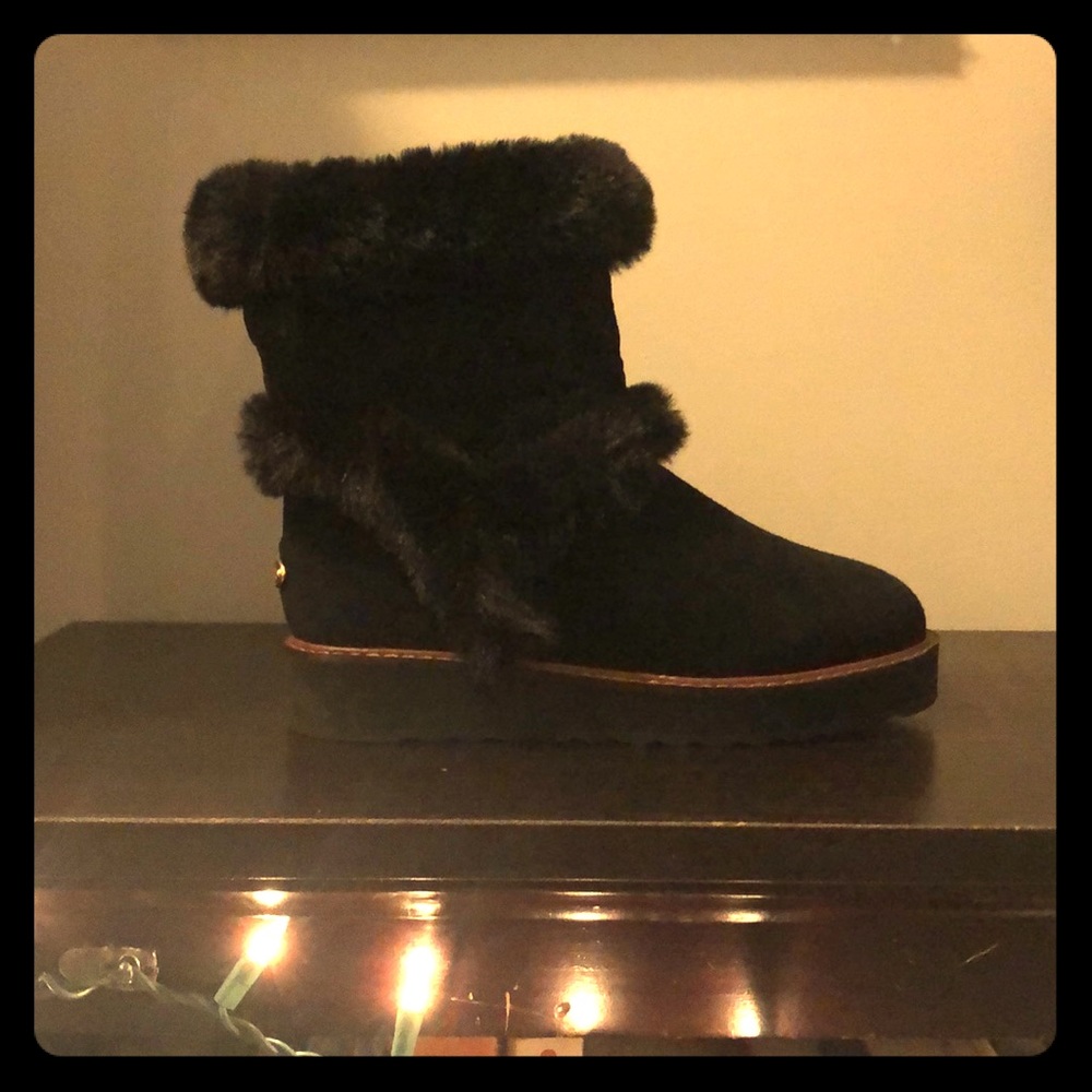Fur-lined boots. Brand new, never been worn.